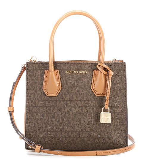 michael kors book bag dillards|Michael Kors handbag with wallet.